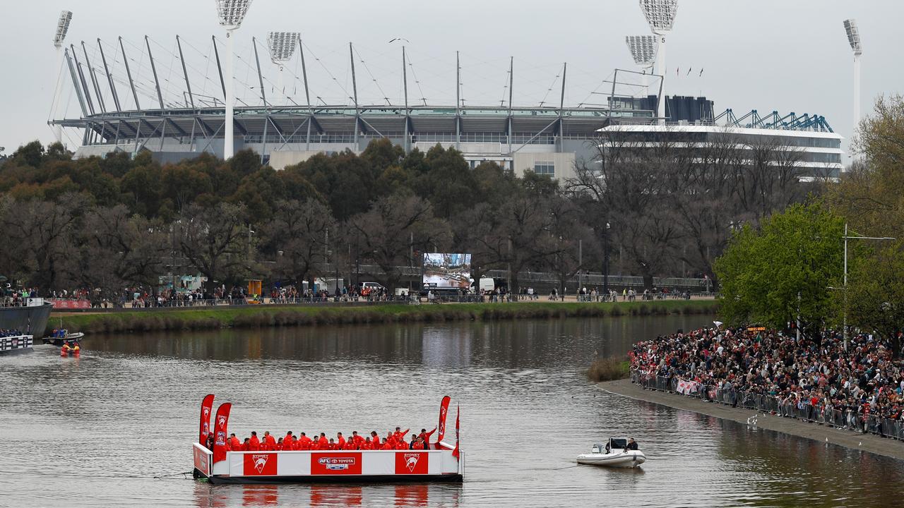 The Sydney Swans squint at the fans. Photo by Dylan Burns/AFL Photos via Getty Images.