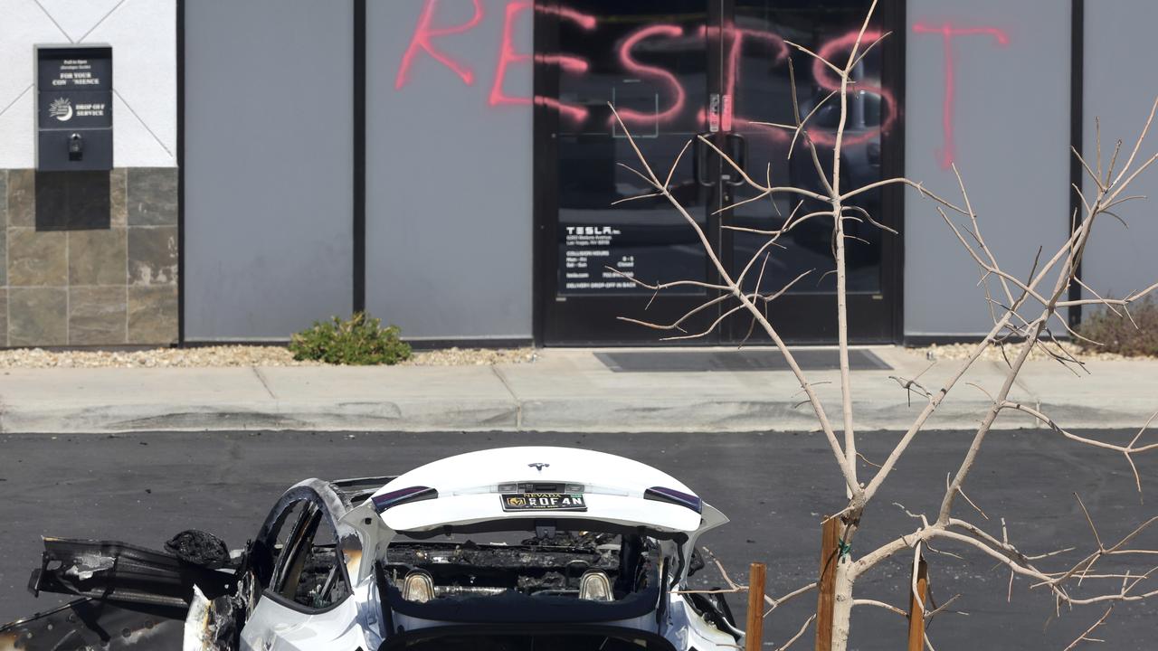 A burned Tesla vehicle is seen at a Tesla collision centre in Las Vegas. Picture: Steve Marcus/Las Vegas Sun via AP