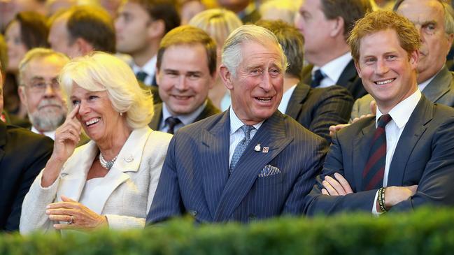 Royal insiders say King Charles (with Prince Harry and Camilla in 2014) would like to fix things with his son, but other members of the Royal Family are not so keen. Picture: Getty