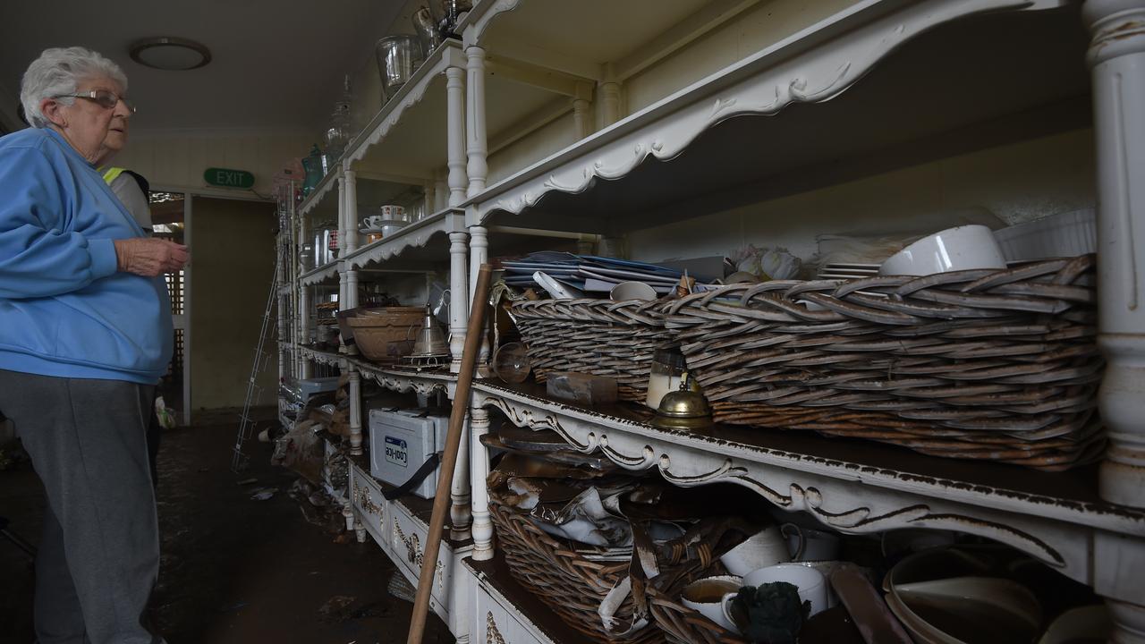 Flood waters reached to the 2nd shelf in the almost 200 year old home of Kathryn Bramich as residents begin the task of cleaning up following the huge flood that swept through the small town of Latrobe, Thursday, June 9, 2016. (AAP Image/Dean Lewins)