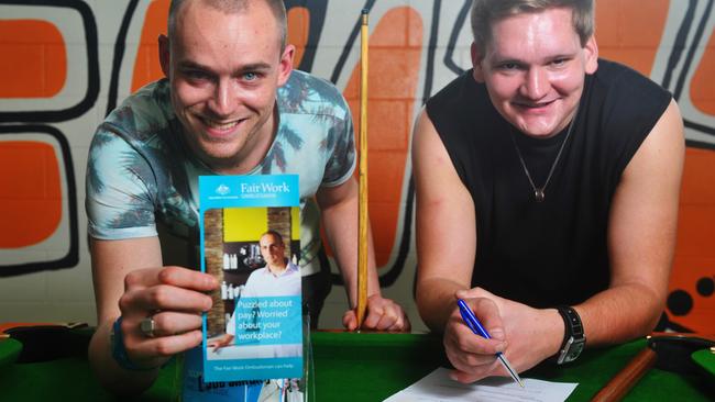 Joey Folkersma, 27 from Holland (left) and Tobias Wichelmy, 24, Germany have just landed in Australia and are looking to work immediately but are first reading about the Fairwork.