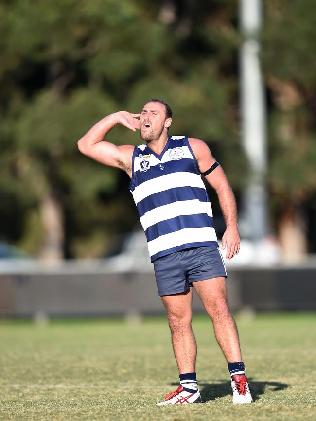 Can’t hear you now...Chelsea's Curtis Bywater reacts after booting a goal against his former side, Langwarrin, on Saturday. Picture: Jason Sammon.