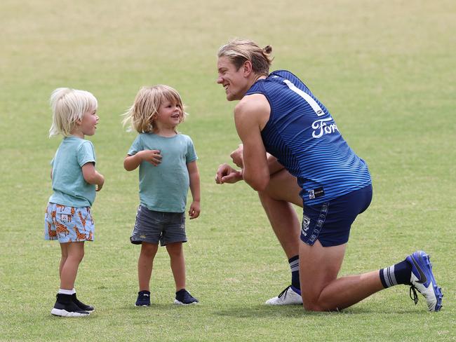 Rhys Stanley with his son Jagger and Patrick Dangerfield’s son George. Picture: Michael Klein