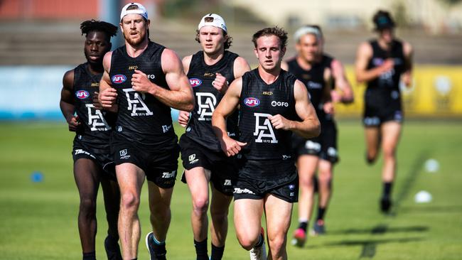 Port Adelaide players hit the track at Alberton on Friday. Picture: Daniel Kalisz/Getty Images