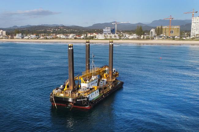 The giant Rock Dredge works on the Artificial reef just offshore from Nineteenth Ave Palm Beach. Picture Glenn Hampson