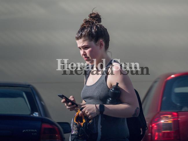 Disgraced wellness blogger Belle Gibson walks from the Reservoir Leisure Centre. Picture: Jake Nowakowski