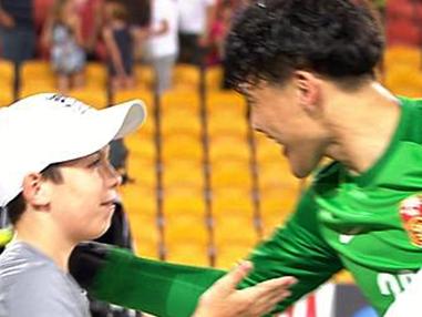 Screen grab from Asian Cup match between China and Saudi Arabia at Suncorp Stadium. China's Wang Dalei saves a penalty thanks to advice from ball boy Stephen White.