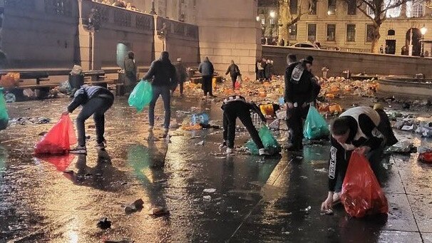 Newcastle fans clean up Trafalgar Square ahead of the 2023 Carabao Cup Final at Wembley Stadium.