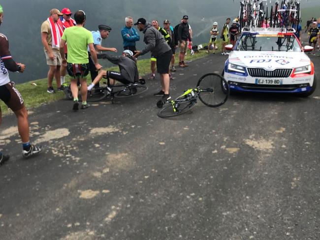 Chris Froome pulled off his bike by police , PIC: Albert Secall