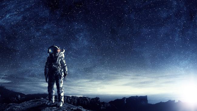 Astronaut in space suit. Elements of this image furnished by NASA.