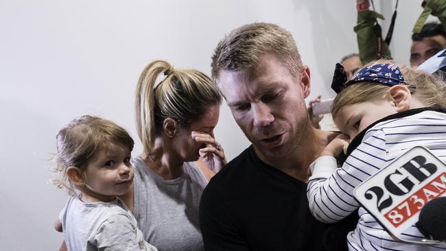 Australian Test cricketer David Warner and family arrives at Sydney International Airport. Picture: Brook Mitchell