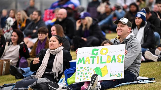 People gather outside of the stadium to watch the Matilda's World Cup match during the 2023 AFL Round 22 match between the West Coast Eagles and the Fremantle Dockers at Optus Stadium on August 12, 2023 in Perth, Australia. (Photo by Daniel Carson/AFL Photos via Getty Images)