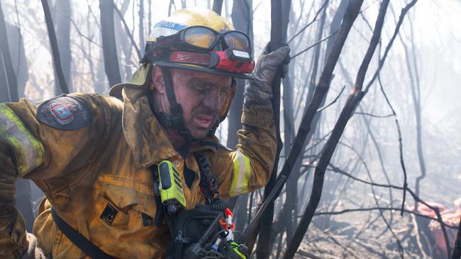 The Tasmanian Fire Service's Remote Area Team continue to control and contain bushfires on the state's West Coast. Picture: Warren Frey