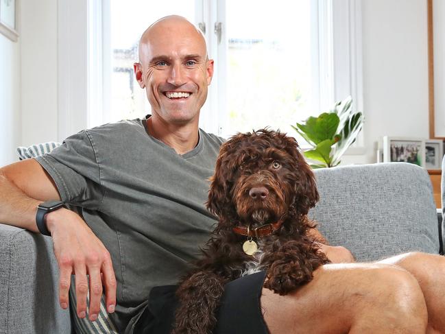 -FOR SUNDAY MAIL SA - NOVA radio host Ryan 'Fitzy' Fitzgerald pictured at his home in Balmain with spoodle dog Beastie. For Mental Health campaign launch. Picture: Toby Zerna