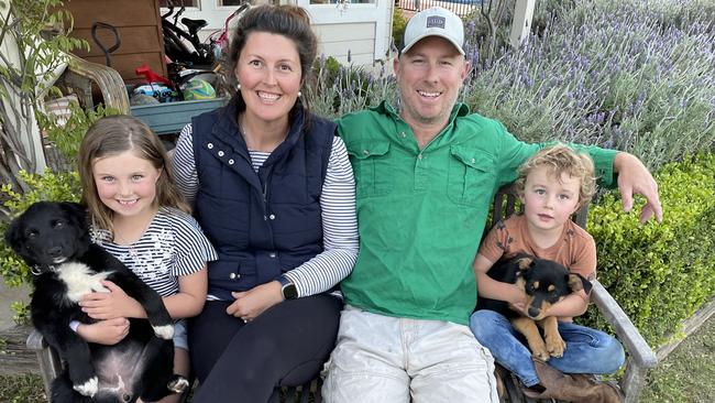 Belle Moylan, her husband Chris and children Georgia and Jack with their dogs in Mudgee.