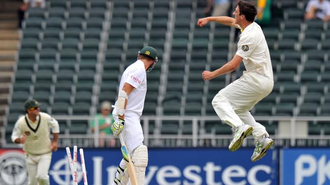 Cummins takes the wicket of South African cricketer Morne Morkel for a duck on day four of the second Final Test between Australia and South Africa, Johannesburg, November 20, 2011. Picture: AFP Photo/Alexander joe