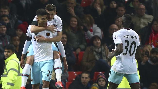 West Ham United's Ashley Fletcher, left celebrates.