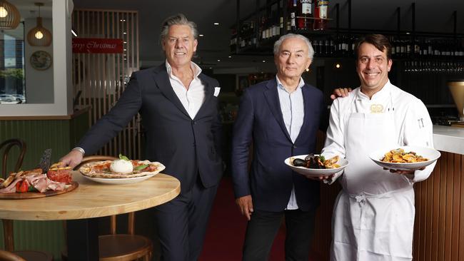 Shane Fell and Dino Mione, business partners of Fellini Restaurant, with executive chef Daniele Cavallucci from Rome. Fellini Restaurant has opened on the Hobart waterfront. Picture: Nikki Davis-Jones