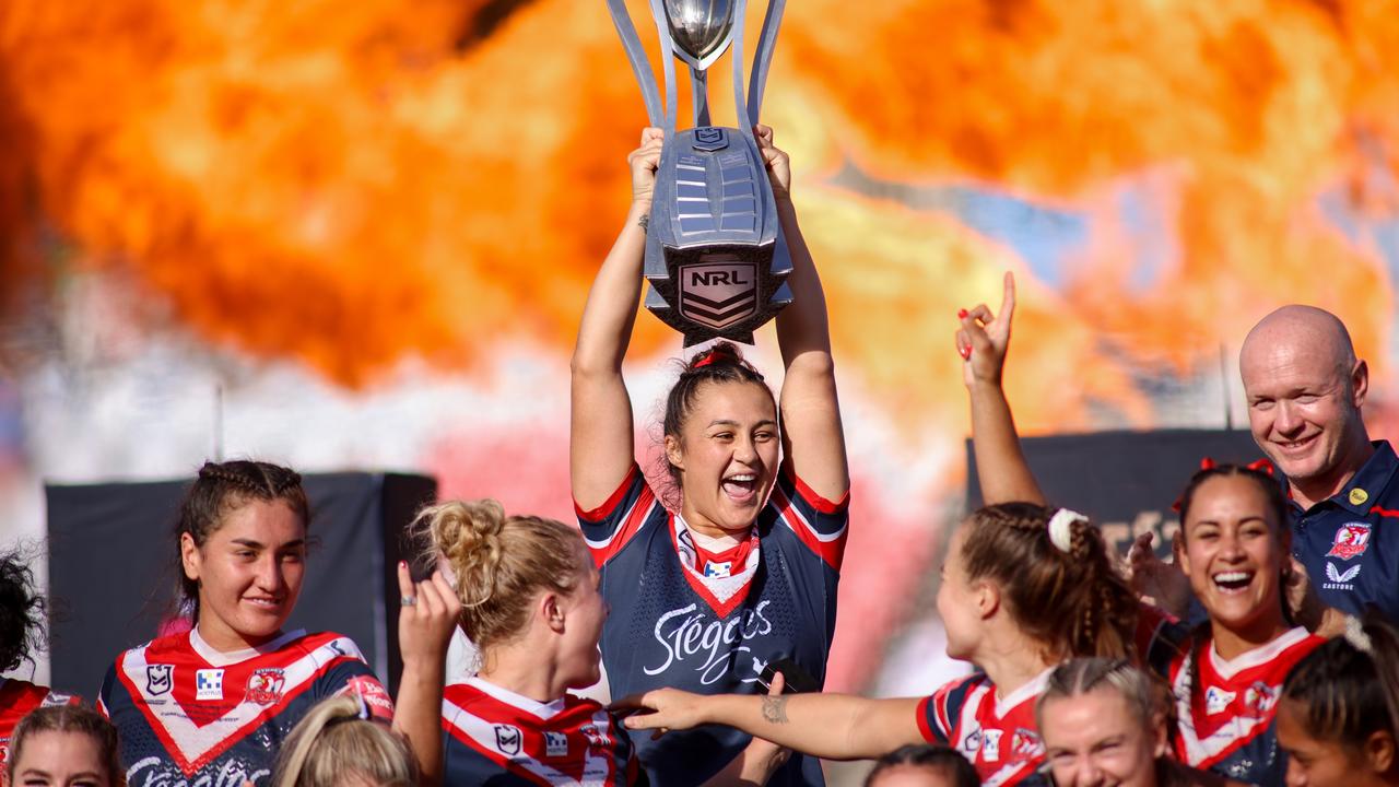 Corban Baxter lifts the trophy after winning the 2021 NRLW grand final. Picture NRL photos