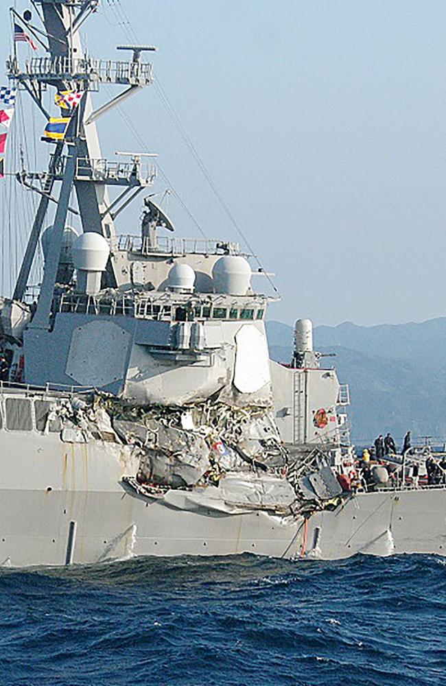 A photo from Japan Coast Guard shows damage to the guided missile destroyer USS Fitzgerald after it collided with a Philippine-flagged container ship on June 17, 2017. Picture: AFP