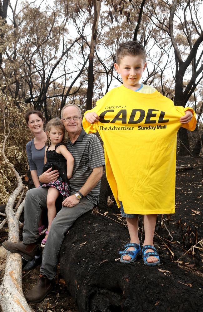 Manfred Eckert with his daughter Melanie Growden and her children Jaydon and Bella at Manfred's Checker Hill Rd house, near Cudlee Creek. Jaydon is wearing one of the <i>The Advertiser</i>’s Farewell Cadel T-shirts. Picture: Calum Robertson