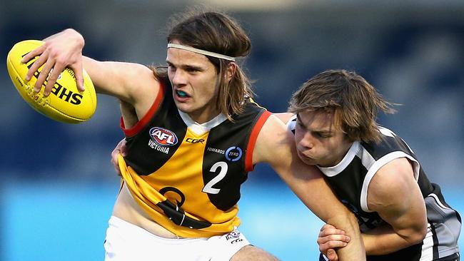 Hunter Clark of the Dandenong Stingrays is tackled during the TAC Cup round 16 match against the Greater Western Victoria Rebels at MARS Stadium. Picture: Robert Prezioso