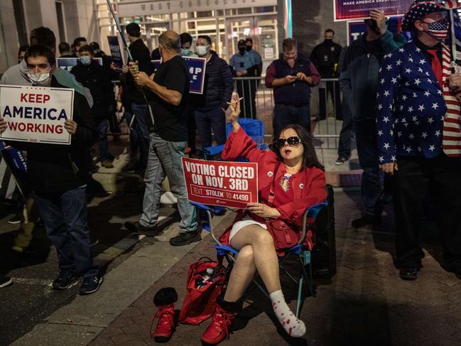 Supporters of Donald Trump hold signs and chant slogans during a protest outside the Philadelphia Convention centre. Picture: Getty Images/AFP