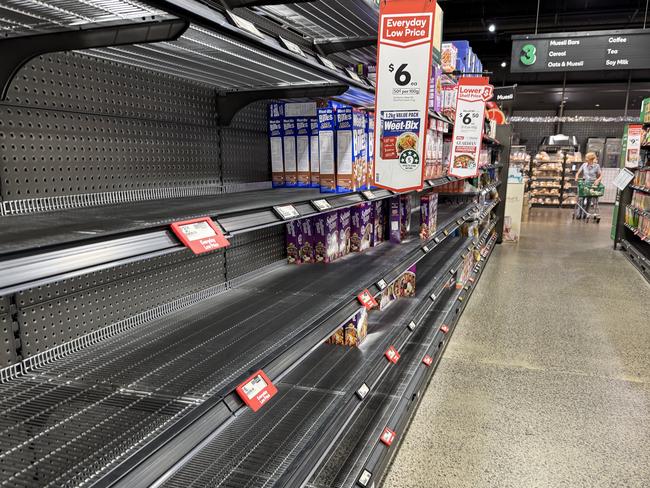 Empty shelving in Woolworths Camberwell in Melbourne.    Picture: Alex Coppel