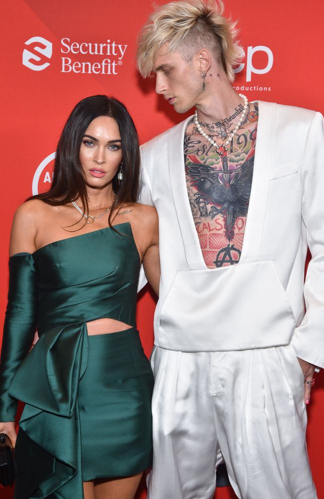 Fox debuted her new tattoo alongside Machine Gun Kelly at the AMAs.