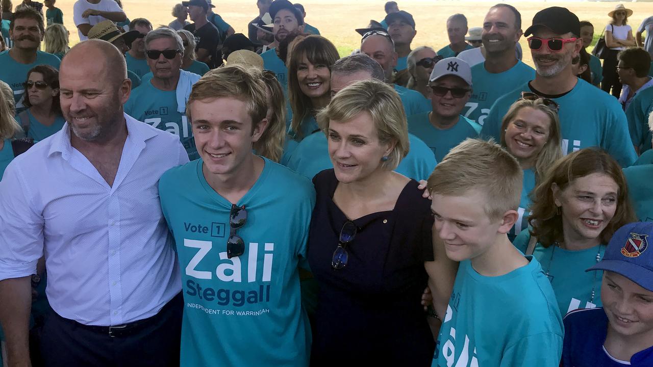 Zali Steggall poses for a photograph with her family during a press conference to announce her campaign. Picture: Luke Costin/AAP