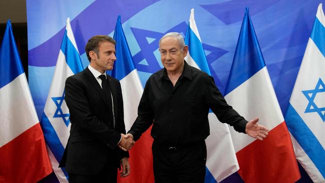 Israeli Prime Minister Benjamin Netanyahu (R) greets French President Emmanuel Macron before a meeting in Jerusalem on October 24, 2023. Picture: AFP