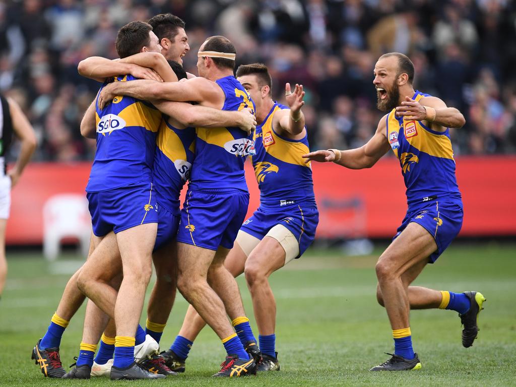 West Coast players celebrate after defeating Collingwood in the thrilling 2018 grand final. Picture: AAP Image/Julian Smith