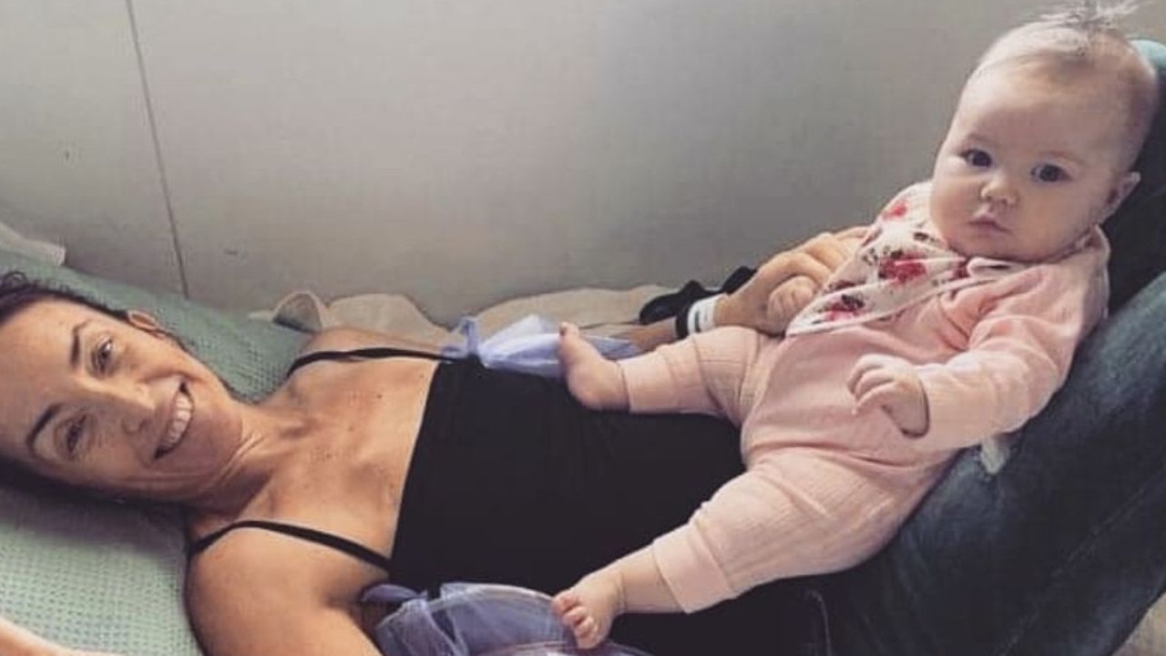 Emma Eckersley the day after her double masectomy with her daughter. Picture: Supplied