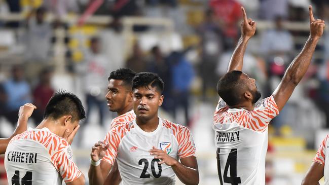 India's forward Sunil Chhetri (2nd-L) celebrates after scoring a goal during the 2019 AFC Asian Cup Group A football game between Thailand and India at the Al Nahyan Stadium stadium in Abu Dhabi on January 6, 2019. (Photo by Khaled DESOUKI / AFP)