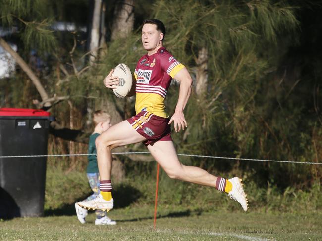 J Shelley races the length of the field to score for Glenmore Park. Picture Warren Gannon Photography