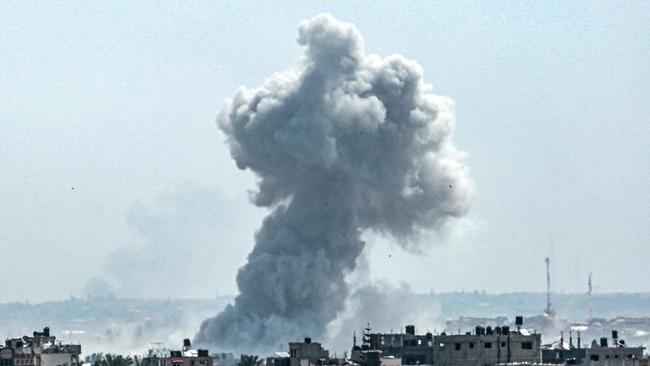 A smoke plume billows following Israeli bombardment north of Nuseirat in the central Gaza Strip. Picture: AFP