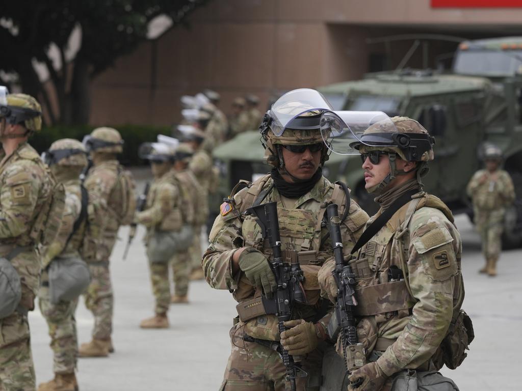 US National Guard troops are deployed outside the federal prison in downtown Los Angeles. Picture: AP