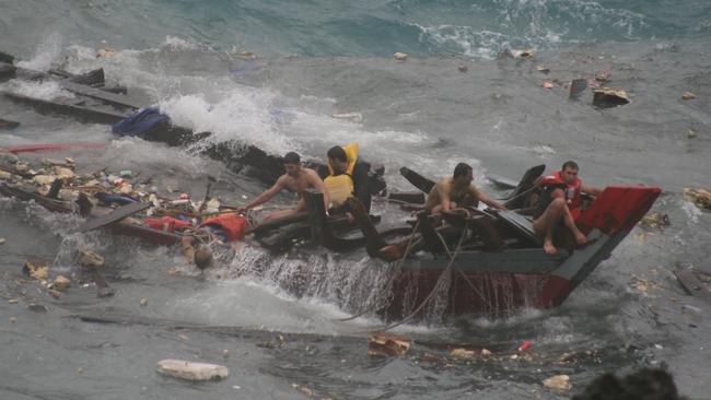 At least 28 asylum seekers were drowned when their wooden fishing boat crashed into cliffs at Christmas Island in 2010.