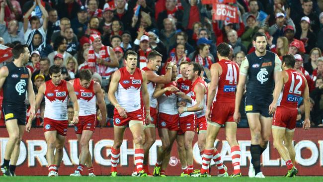 The Swans celebrate a McVeigh goal as they started Carlton’s streak without finals. Picture: AAP Image/Dean Lewins