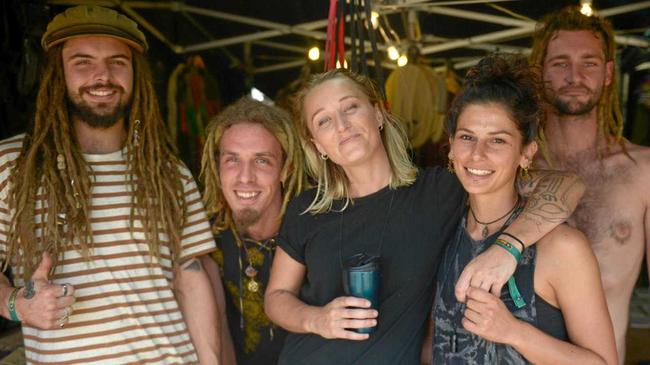 BLOOMING GOOD: John Lenon of Yilgar Designs from Sydney with backpackers Soul, Jess Dowlman Tom Back and Dani Affleck. Picture: Jann Houley
