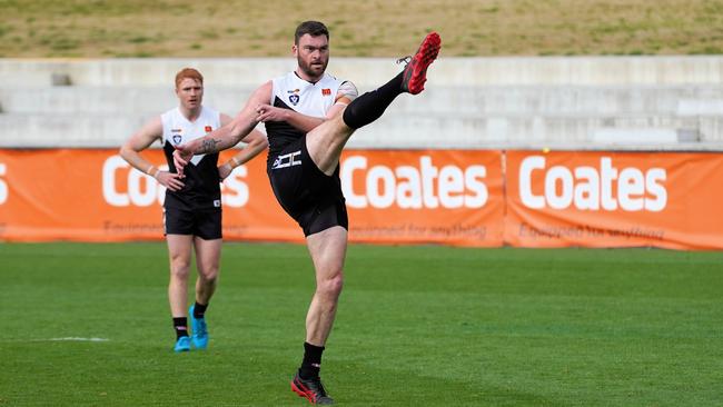 North Ballarat ruckman Cam McCallum kicks the ball long earlier this season. Picture: Adam Cornell