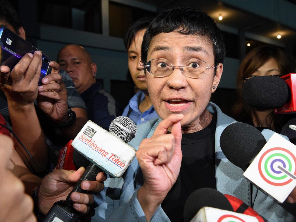 Philippine journalist Maria Ressa speaks to the media as she arrives at the National Bureau of Investigation (NBI) headquarters after her arrest in Manila on February 13, 2019. Picture: Ted Aljibe / AFP