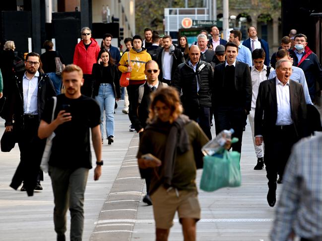 SYDNEY, AUSTRALIA - NewsWire Photos MAY 20, 2021.Sydney-siders walk through the CBD . Australia's unemployment rate has fallen to 5.5 per cent, according to latest figures.The end of the federal government's JobKeeper wage subsidy in March was expected to create a cliff that would plunge thousands of workers onto welfare. But the number of Australians in work fell only marginally by almost 30,600 between March and April, to remain just over 13 million.The jobless rate fell by 0.2 percentage points to 5.5 per cent, according to Australian Bureau of Statistics (ABS) data released on Thursday.Picture: NCA NewsWire / Jeremy Piper