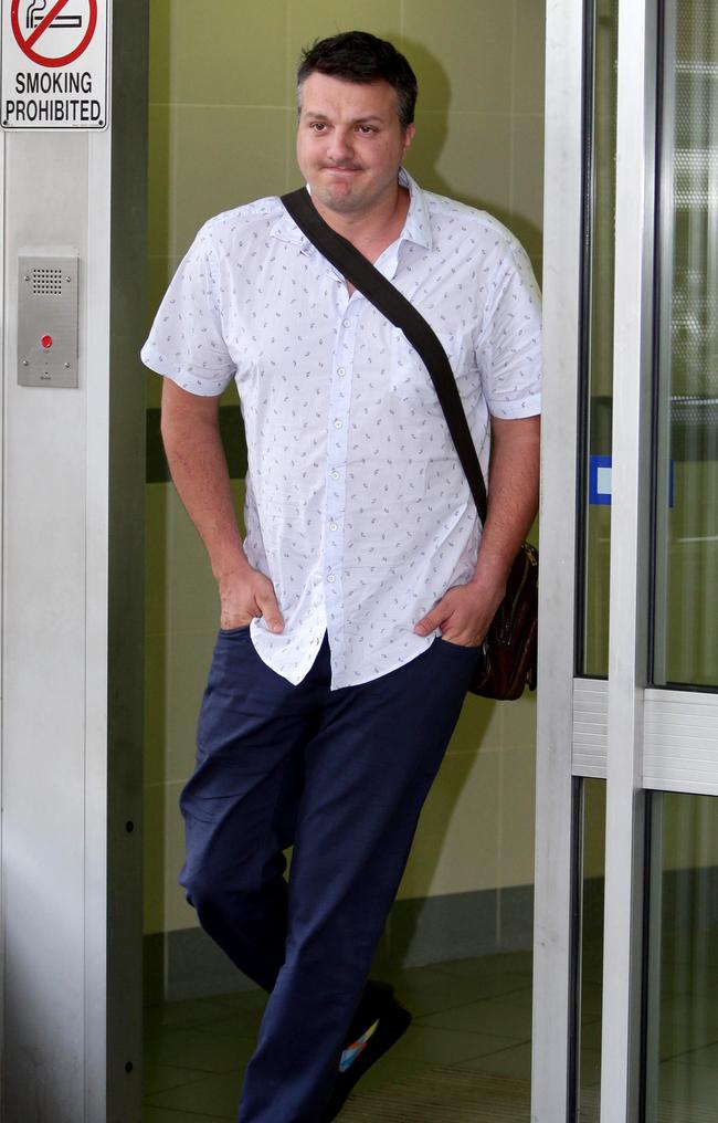 Restaurateur Daniel Milos leaves the Brisbane watchhouse after his arrest