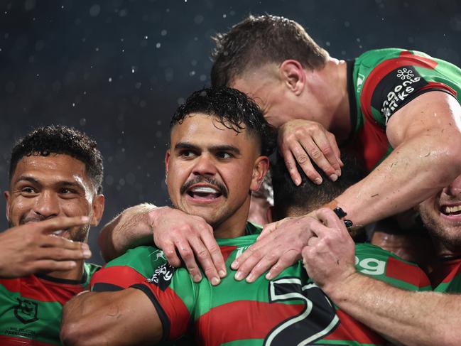 SYDNEY, AUSTRALIA - JUNE 14: Latrell Mitchell of the Rabbitohs celebrates a try by team mate Alex Johnston of the Rabbitohs during the round 15 NRL match between South Sydney Rabbitohs and Brisbane Broncos at Accor Stadium, on June 14, 2024, in Sydney, Australia. (Photo by Cameron Spencer/Getty Images)