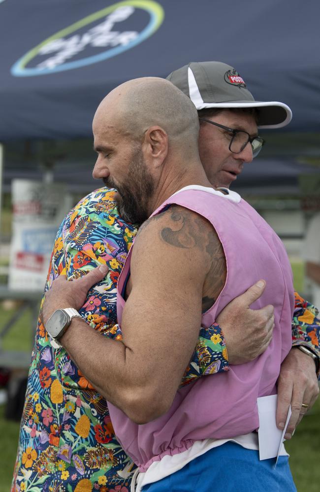 Brothers Geoff McDonald and Grant McDonald embrace after Grant competed in the John “Cracker” McDonald 300 metres open. The Arthur Postle Gift in Pittsworth. Saturday 18th January, 2025. Picture: Nev Madsen.