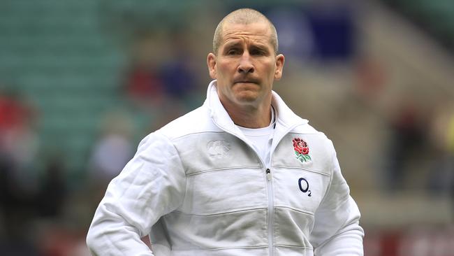 England's head coach Stuart Lancaster watches his team warm up before the start of their Six Nations rugby union match against Italy at Twickenham Stadium in London, Sunday, March 10, 2013. (AP Photo/Sang Tan)