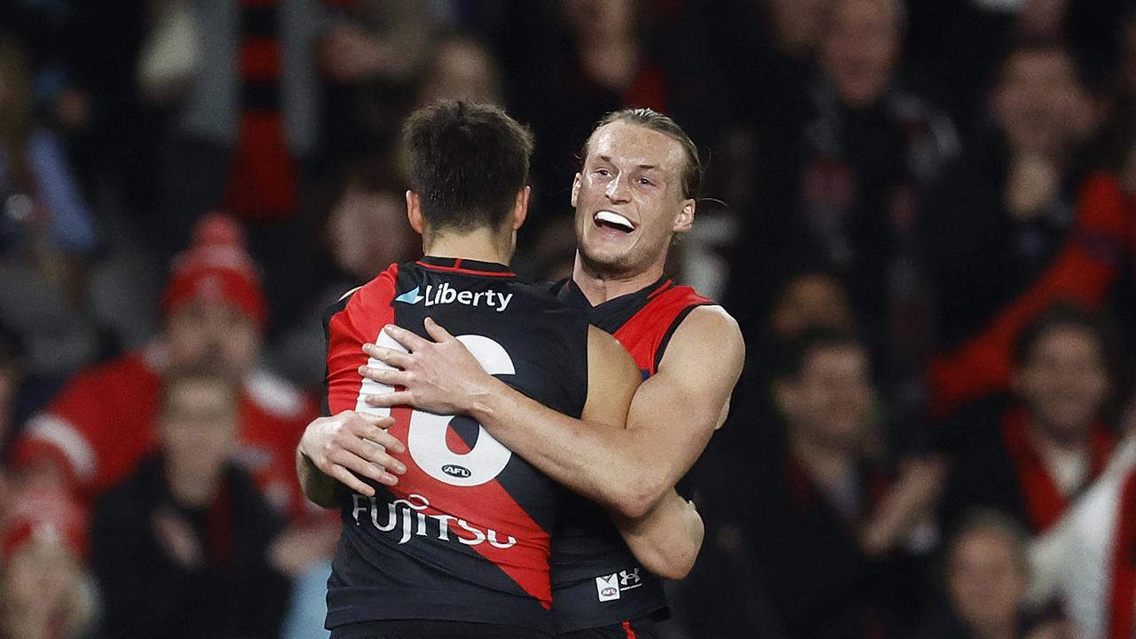 MELBOURNE, AUSTRALIA – JULY 29: Archie Perkins of the Bombers (L) celebrates with Mason Redman of the Bombers after kicking a goal. Picture: Getty Images