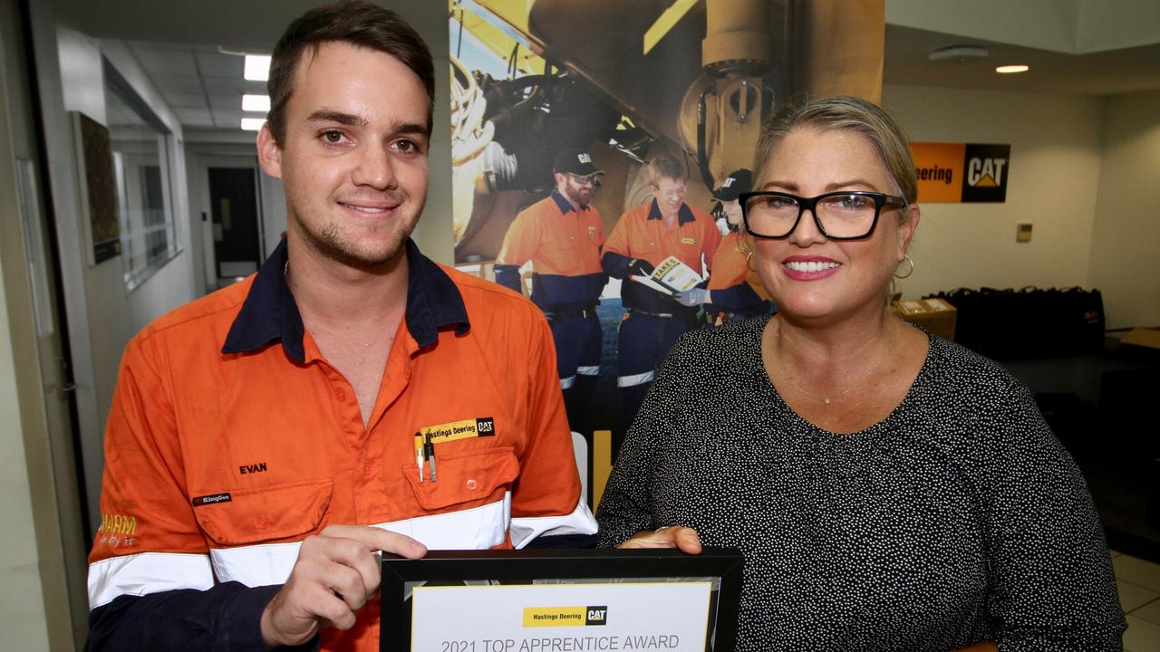 Mackay diesel fitter Evan Crisafulli stands with Hasting Deering manager Katrina Shaw. Mr Crisafulli was named Hastings Deering's 2021 Apprentice of the Year. Picture: Supplied