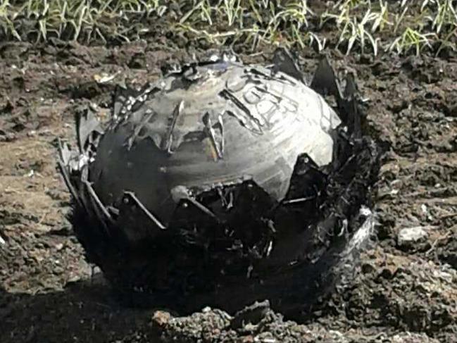 This picture taken on May 19, 2014 shows space debris that fell in Qiqihar, northeast China's Heilongjiang province. Objects that crashed to the ground in China have been identified as space debris, state media reported, after a Russian rocket carrying a communications satellite fell back to Earth minutes after lift-off. CHINA OUT AFP PHOTO